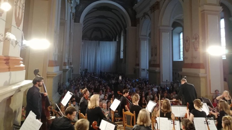 The choir and orchestra performing in Ukraine