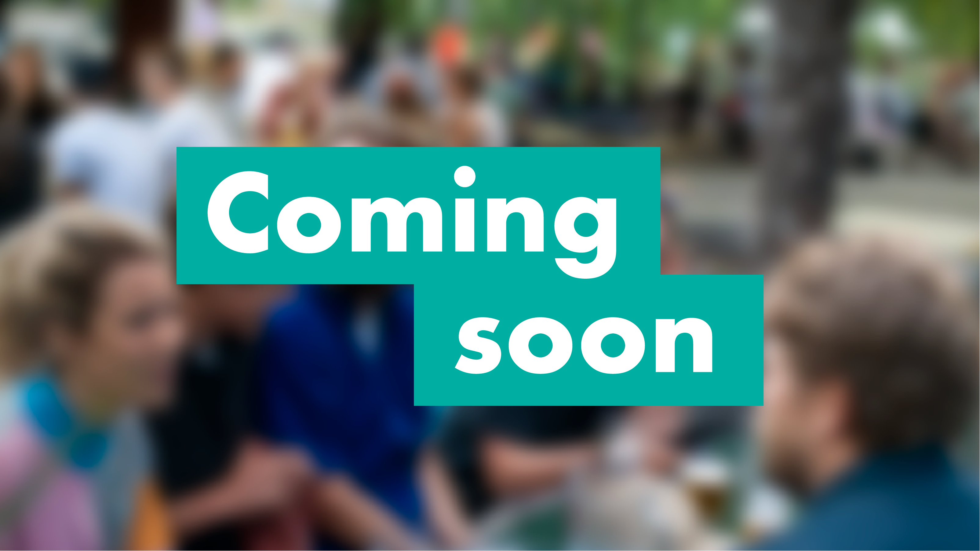 Text: Coming soon, blurred background