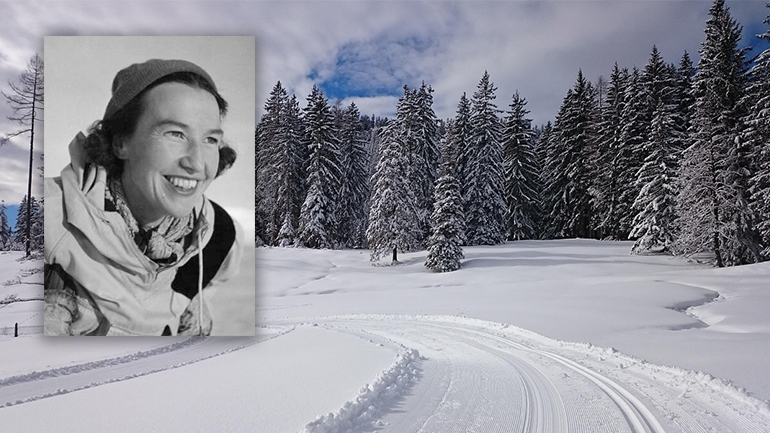 Portrait of Inga Löwdin. Bakground: snowy landscape and ski tracks.