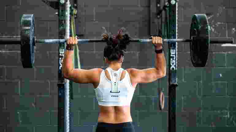 ack of woman lifting weights