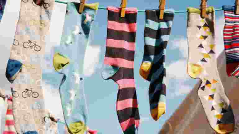 Photo of socks drying on a washing line