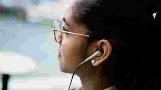 Person with earphones.