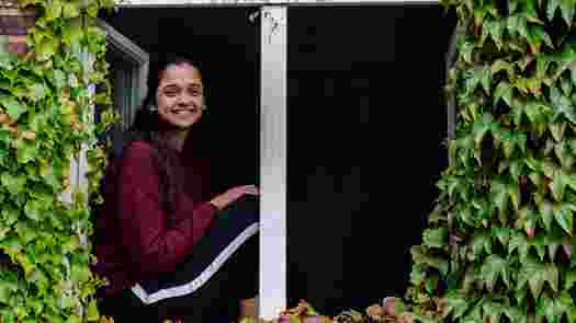 Person sitting in a window 